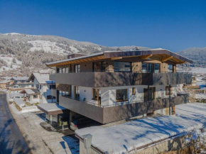 Apartment in Brixen im Thale with a garden
